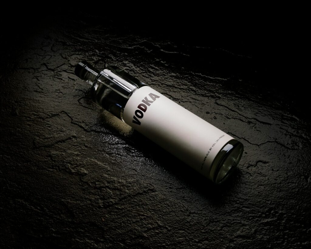 white and black tube type mod whiskey or vodka